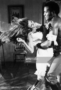 Fighting, Raquel Welch resists the forced romantic attentions of Jim Brown, the Football player turned actor. Moments later, Raquel, actually very much taken with Brown, willingly submits to him. Although there have been numerous interracial bedroom scenes in recent films, "100 Rifles" is probably the first to show integrated kissing scenes close up.