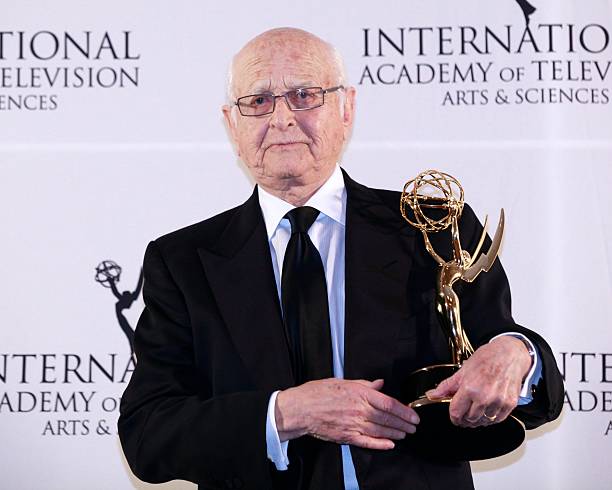 Norman Lear accepting an award.