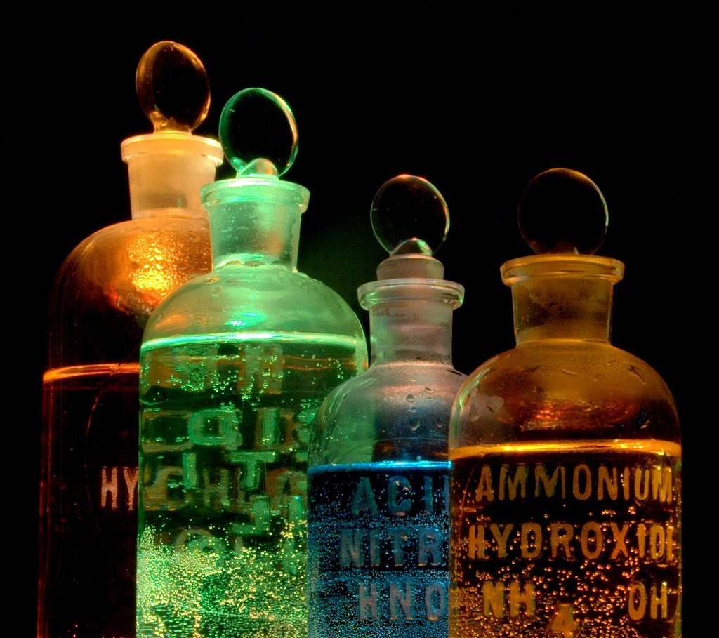 various glass jars with different chemicals in them.